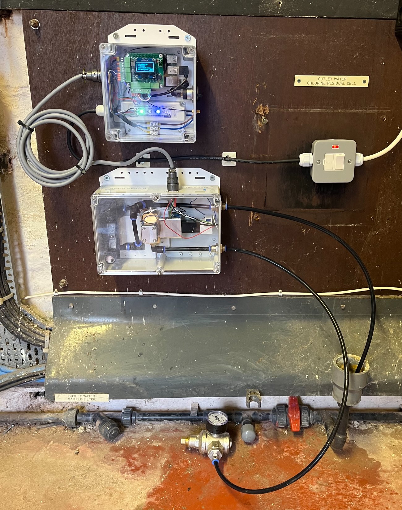 Aqua Alarm sensor and auto-sampler units installed on the outlet-water sample line at a live service reservoir